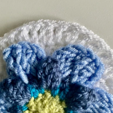 Round 7. Crochet flower granny square close up