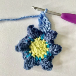 Round 4 crochet flower granny square. Work in progress crochet with pin crochet hook.