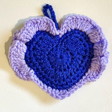 purple crochet heart with lilac frill